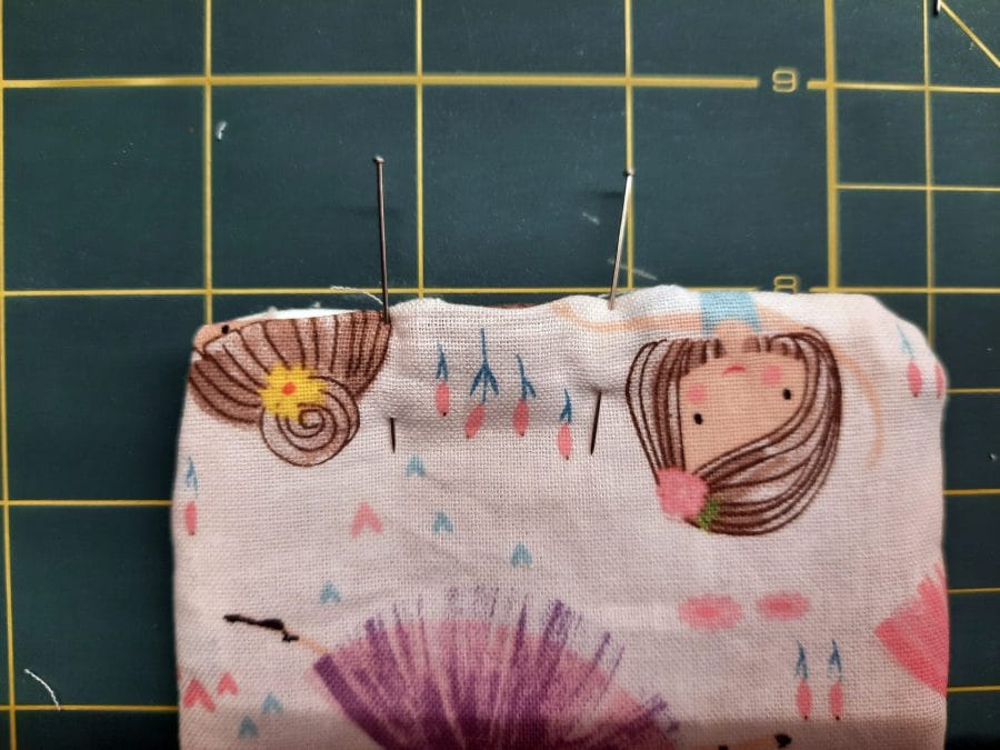Sewing a corner bookmark: to close the turning gap, sew a narrow topstitch all around the edge, as closed to the edge as possible.