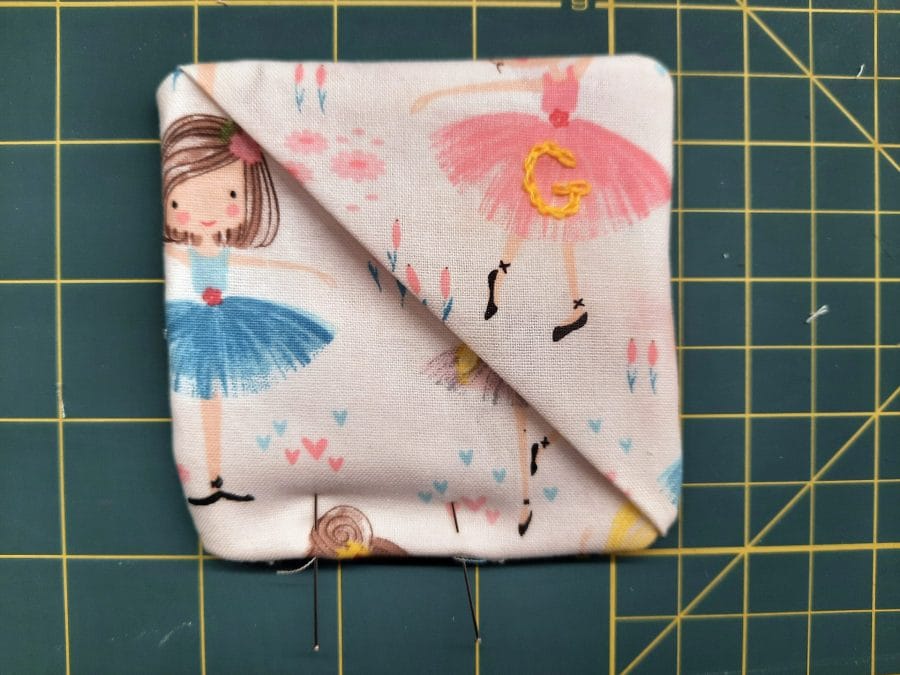Sewing a corner bookmark: to close the turning gap, sew a narrow topstitch all around the edge, as closed to the edge as possible.