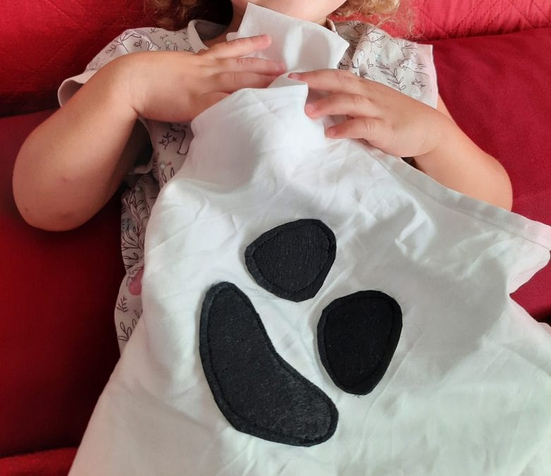 Love at first sight between my daughter and her ghost cape!
