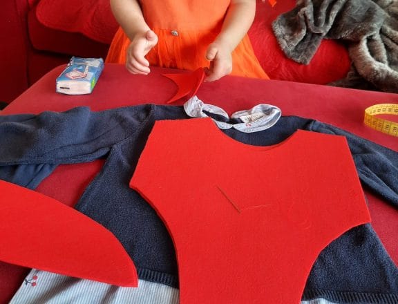 Making the spiderman costume with the help of my daughter