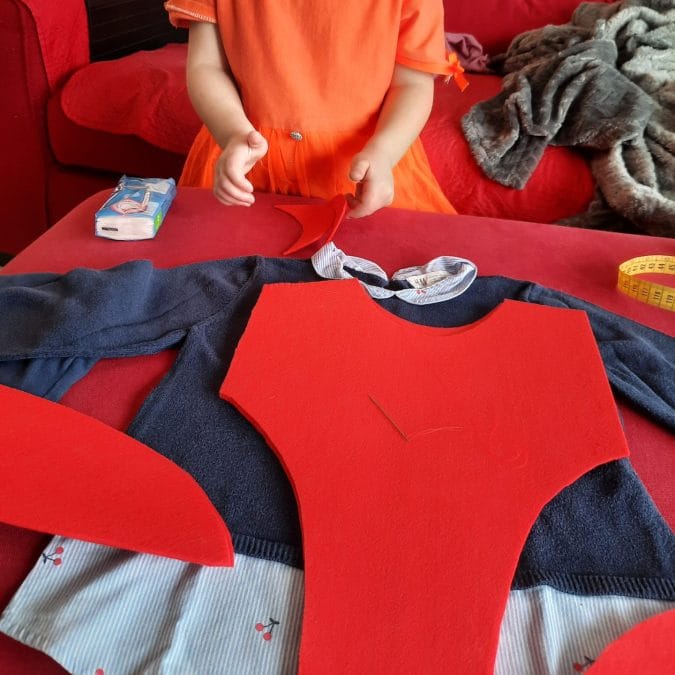 Making the spiderman costume with the help of my daughter