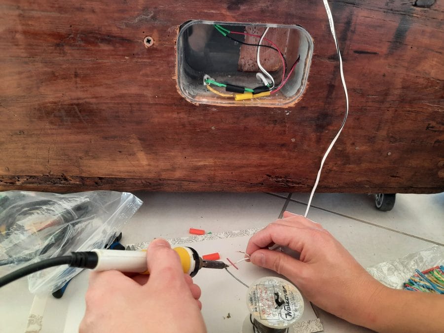 Making a Nativity diorama inside an antique steamer trunk: connecting the lights