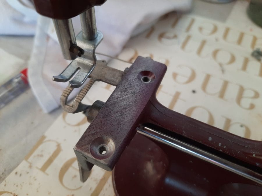 The feed dogs of my Essex MK1 miniature sewing machine fully accessible after removing the stitch plate