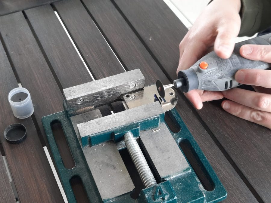 Trying to fix the feed dogs of my Orsha sewing machine by drilling the holes in the needle plate to make them fit