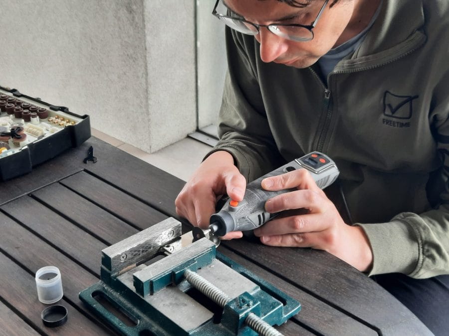 Trying to fix the feed dogs of my Orsha sewing machine by drilling the holes in the needle plate to make them fit