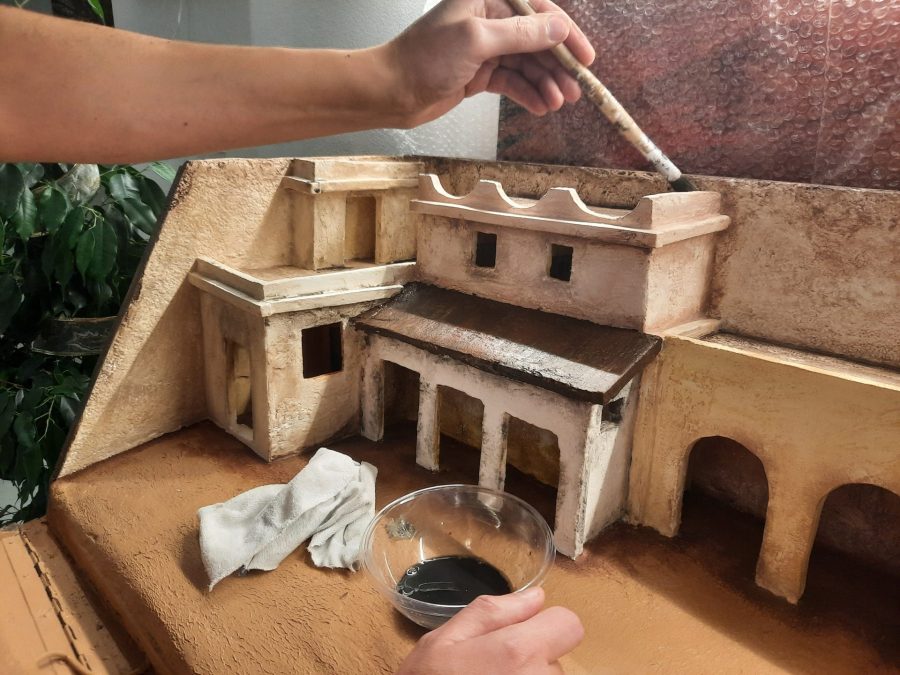 Making a Nativity diorama inside an antique steamer trunk: painting the buildings