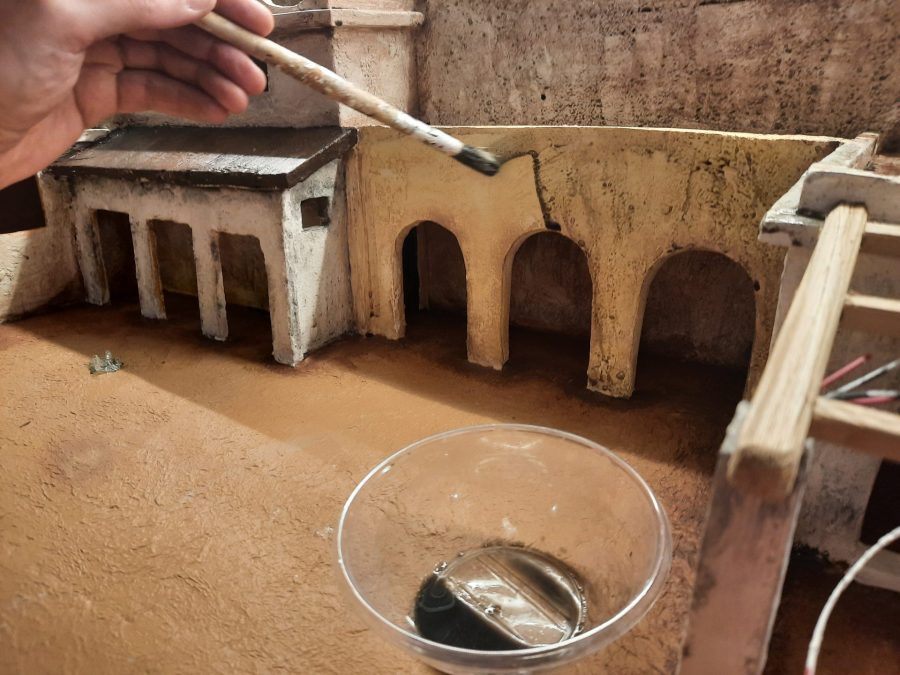 Making a Nativity diorama inside an antique steamer trunk: painting the buildings
