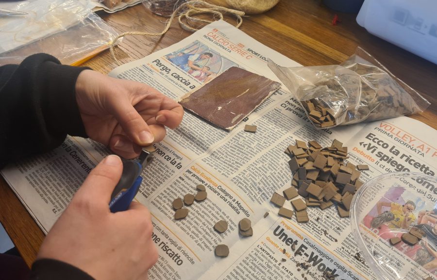 Making a Nativity diorama inside an antique steamer trunk: paving the horses stable and the main square's porch