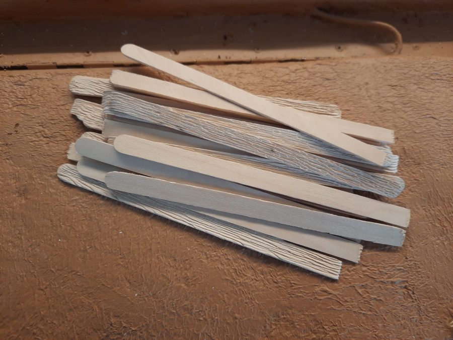 Making a Nativity diorama inside an antique steamer trunk: making a wooden roof out of popsicle sticks