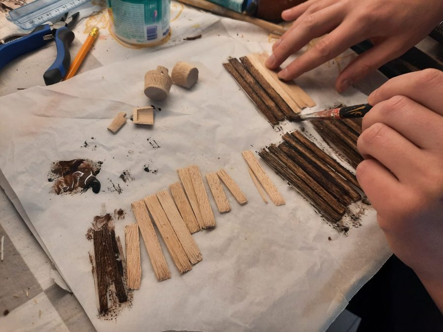 Making a Nativity diorama inside an antique steamer trunk: making a wooden roof out of popsicle sticks
