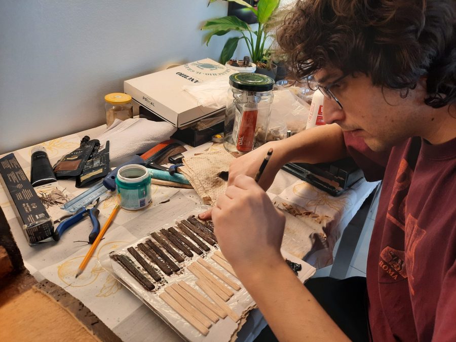 Making a Nativity diorama inside an antique steamer trunk: making a wooden roof out of popsicle sticks