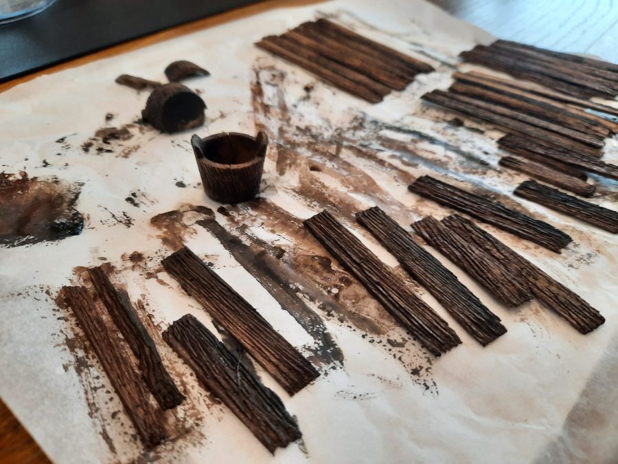 Making a Nativity diorama inside an antique steamer trunk: making a wooden roof out of popsicle sticks