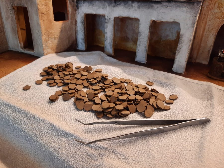 Making a Nativity diorama inside an antique steamer trunk: paving the horses stable and the main square's porch