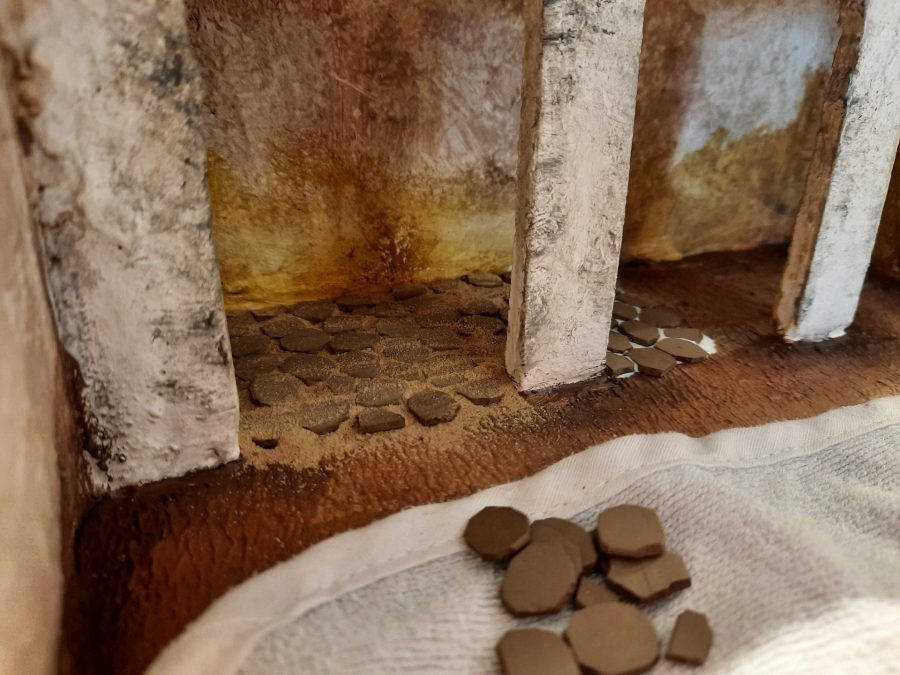 Making a Nativity diorama inside an antique steamer trunk: paving the horses stable and the main square's porch