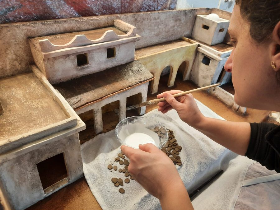 Making a Nativity diorama inside an antique steamer trunk: paving the horses stable and the main square's porch