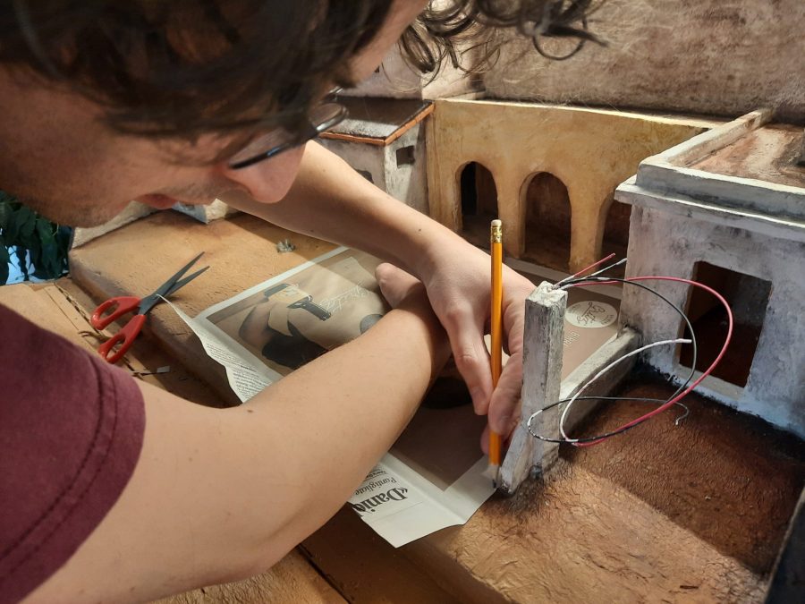 Making a Nativity diorama inside an antique steamer trunk: paving the town square
