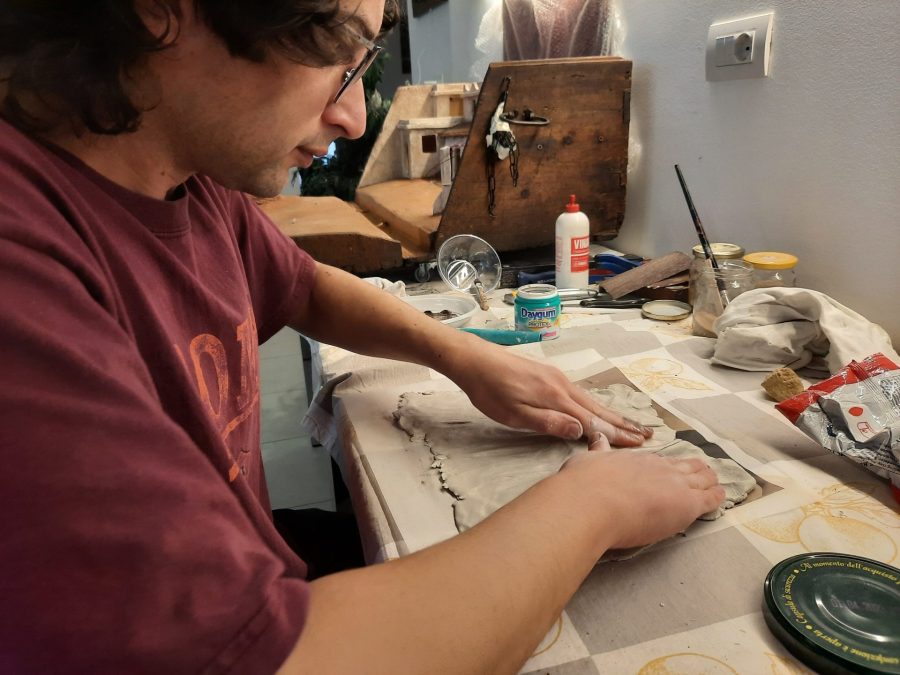 Making a Nativity diorama inside an antique steamer trunk: paving the town square