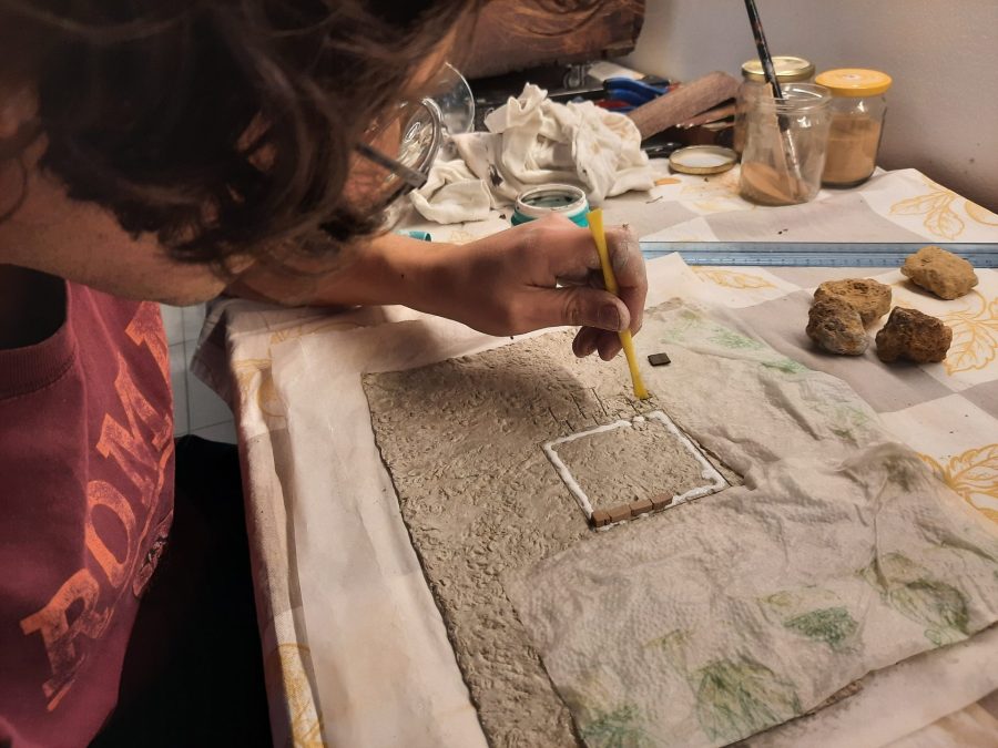 Making a Nativity diorama inside an antique steamer trunk: paving the town square