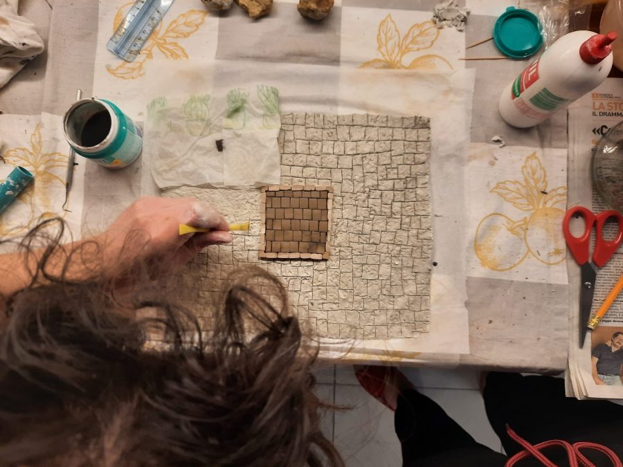 Making a Nativity diorama inside an antique steamer trunk: paving the town square