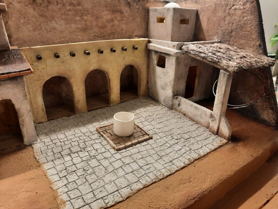 Making a Nativity diorama inside an antique steamer trunk: paving the town square