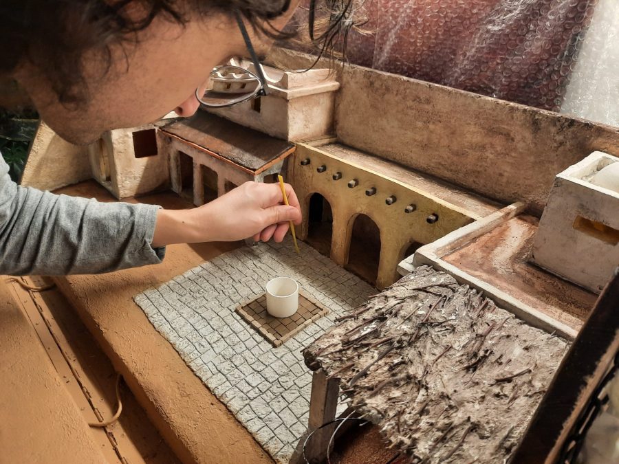Making a Nativity diorama inside an antique steamer trunk: paving the town square