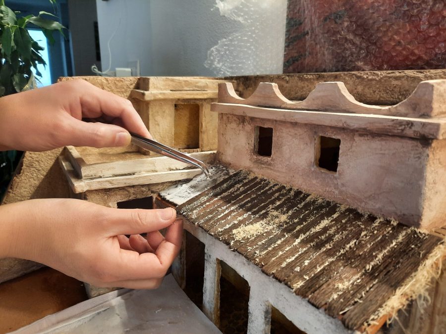 Making a Nativity diorama inside an antique steamer trunk: making a wooden roof out of popsicle sticks