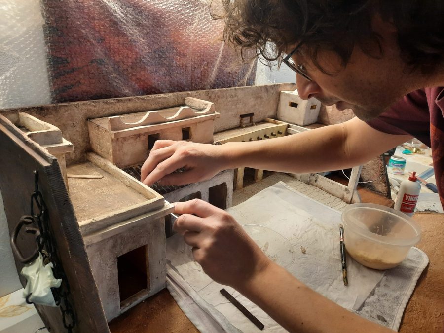 Making a Nativity diorama inside an antique steamer trunk: making a wooden roof out of popsicle sticks
