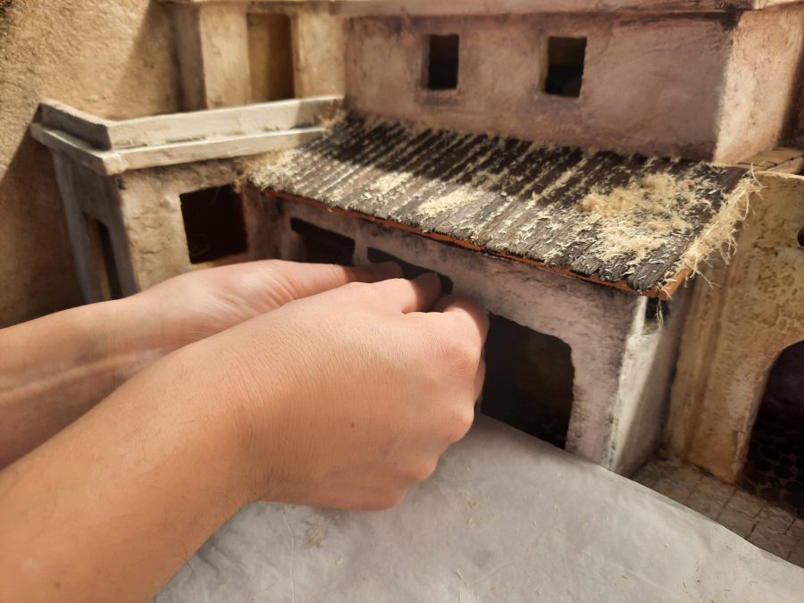 Making a Nativity diorama inside an antique steamer trunk: making a wooden roof out of popsicle sticks