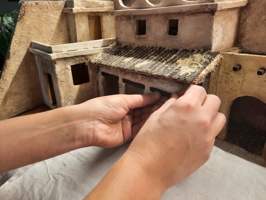 Making a Nativity diorama inside an antique steamer trunk: making a wooden roof out of popsicle sticks
