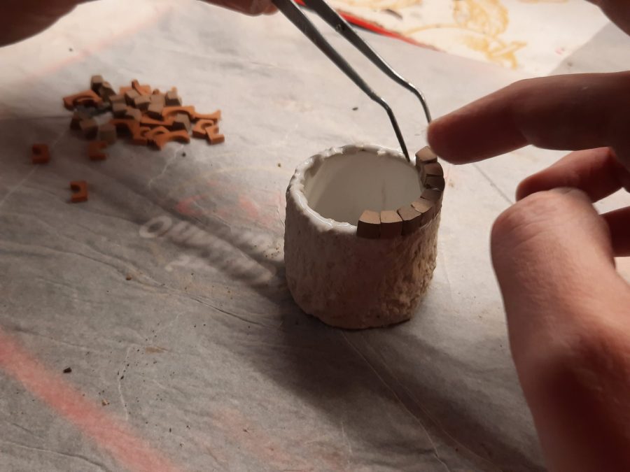 Making a Nativity diorama inside an antique steamer trunk: crafting the town well