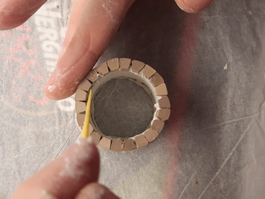 Making a Nativity diorama inside an antique steamer trunk: crafting the town well