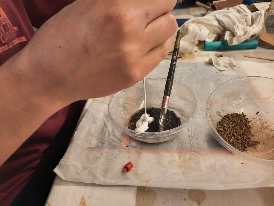 Making a Nativity diorama inside an antique steamer trunk: crafting an indoor pavement