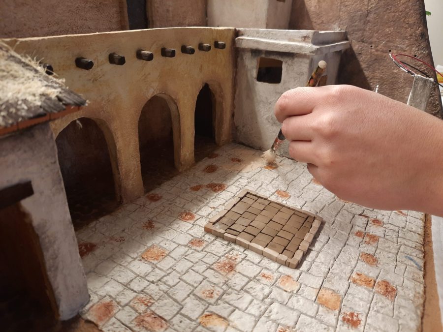 Making a Nativity diorama inside an antique steamer trunk: painting the main square