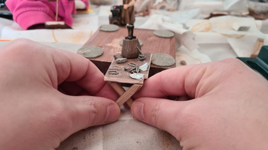 Making a Nativity diorama inside an antique steamer trunk: furnishing the blacksmith's workshop