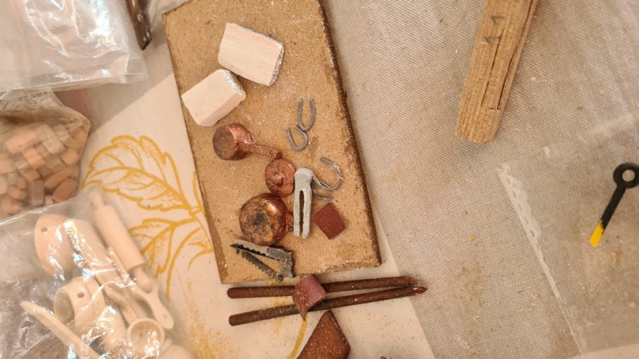 Making a Nativity diorama inside an antique steamer trunk: furnishing the blacksmith's workshop