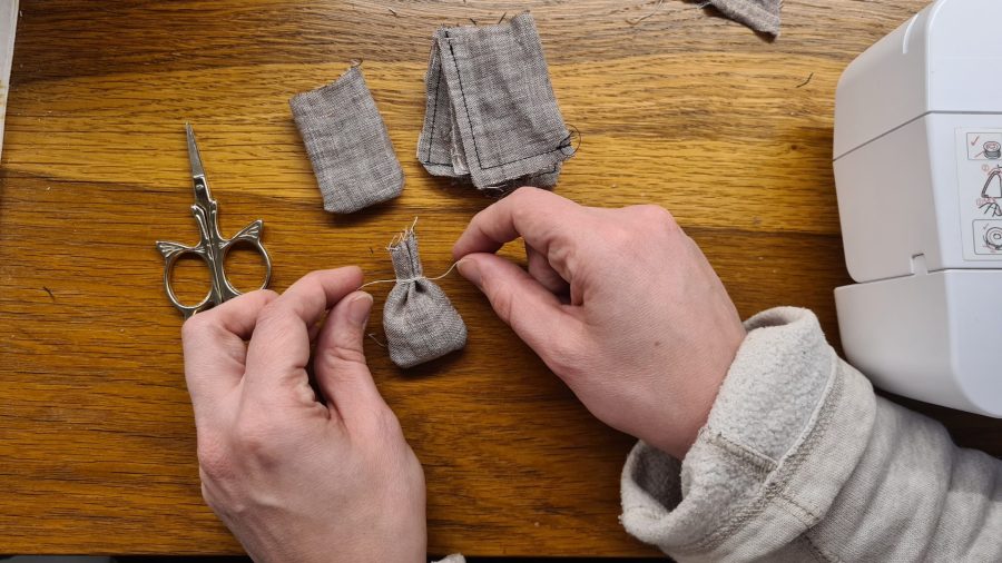 Making a Nativity diorama inside an antique steamer trunk: sewing fabric bags