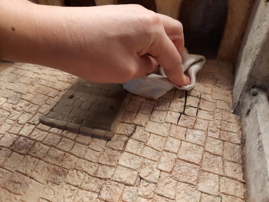 Making a Nativity diorama inside an antique steamer trunk: painting the main square