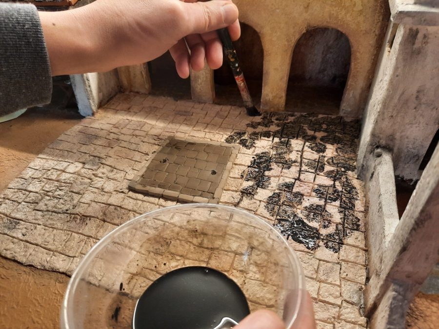 Making a Nativity diorama inside an antique steamer trunk: painting the main square