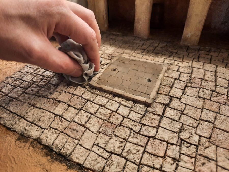 Making a Nativity diorama inside an antique steamer trunk: painting the main square