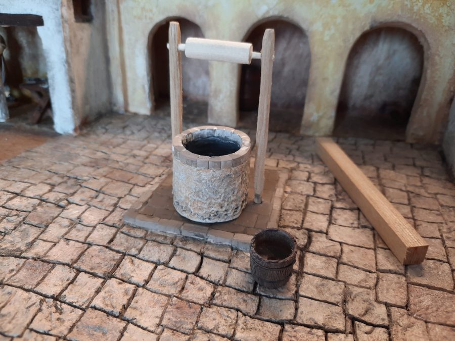 Making a Nativity diorama inside an antique steamer trunk: mounting the well
