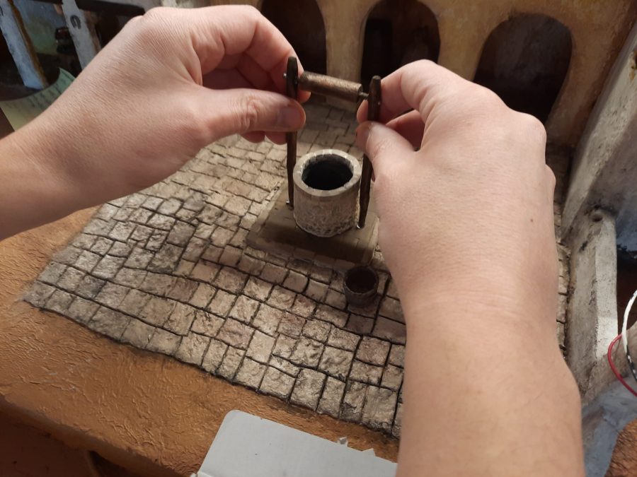 Making a Nativity diorama inside an antique steamer trunk: mounting the well