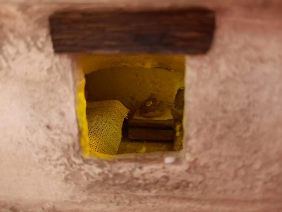 Making a Nativity diorama inside an antique steamer trunk: inserting all the items inside the upper floor bedroom