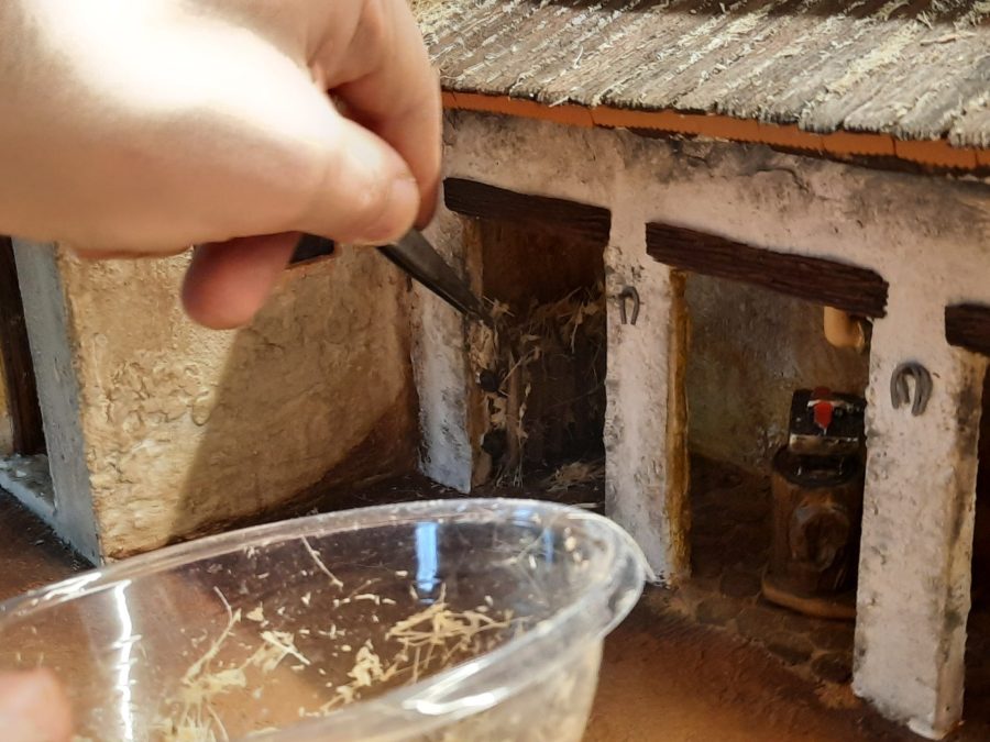 Making a Nativity diorama inside an antique steamer trunk: furnishing the horses stable