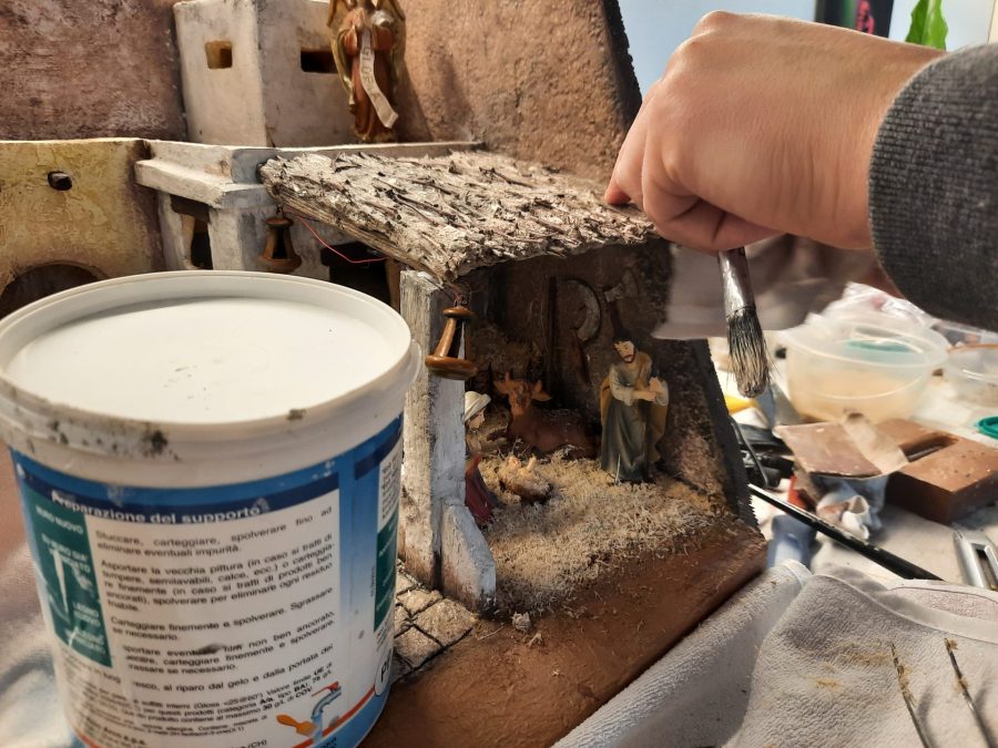 Making a Nativity diorama inside an antique steamer trunk: mounting the holy stable roof
