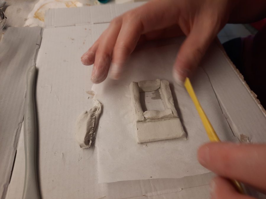 Making a Nativity diorama inside an antique steamer trunk: sculpting the forge