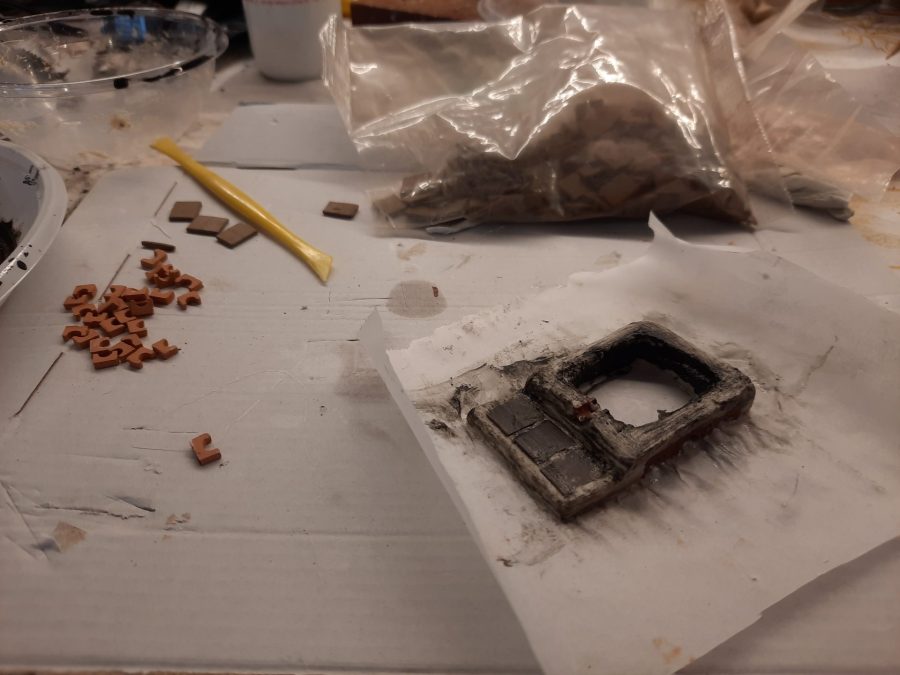 Making a Nativity diorama inside an antique steamer trunk: sculpting the forge