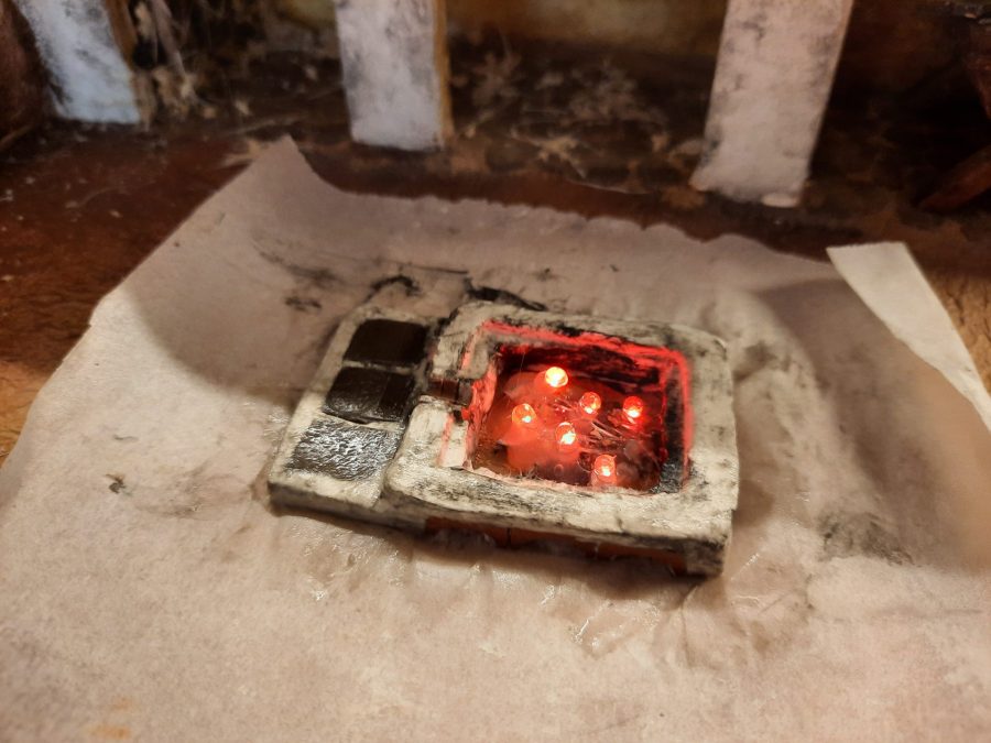 Making a Nativity diorama inside an antique steamer trunk: sculpting the forge