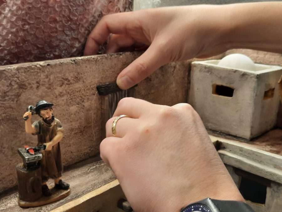Making a Nativity diorama inside an antique steamer trunk: detailing the balcony above the porch