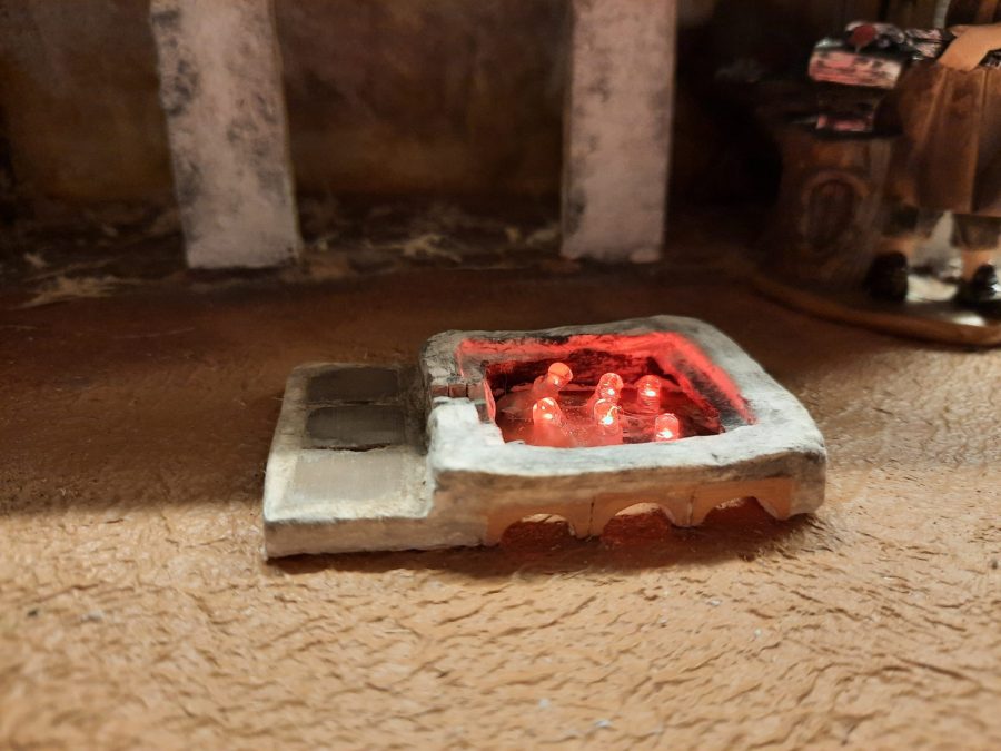 Making a Nativity diorama inside an antique steamer trunk: sculpting the forge