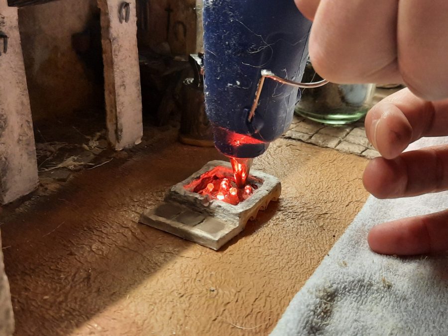 Making a Nativity diorama inside an antique steamer trunk: sculpting the forge